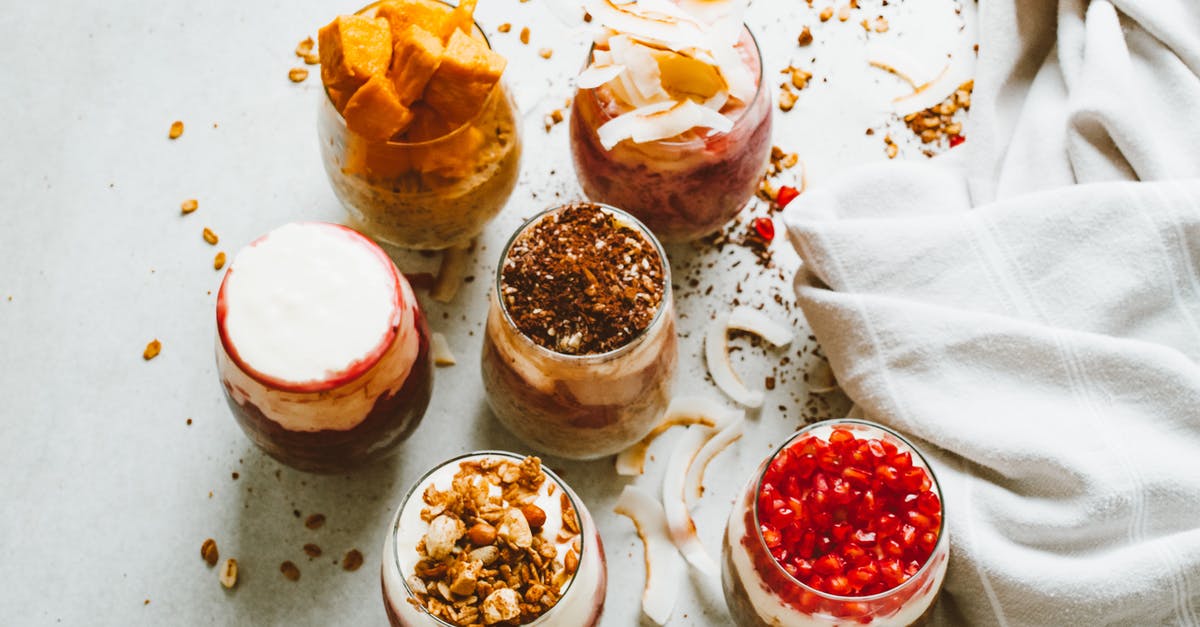 How much Vanilla Essense in 1 Liter Almond Milk - White and Red Ceramic Bowls