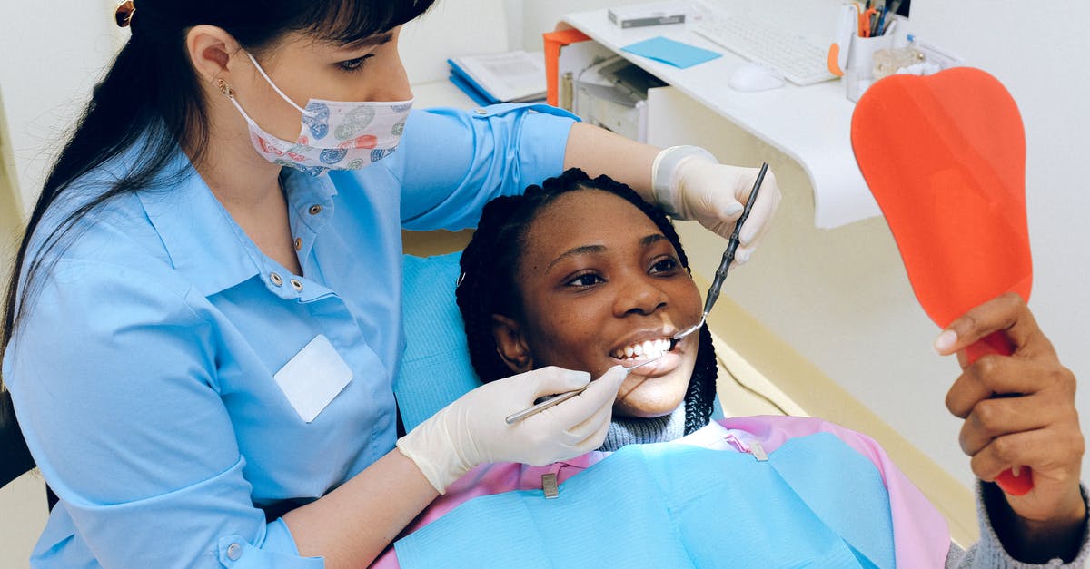 how often is cleaning done in a professional kitchen? - Woman Having Dental Check-up