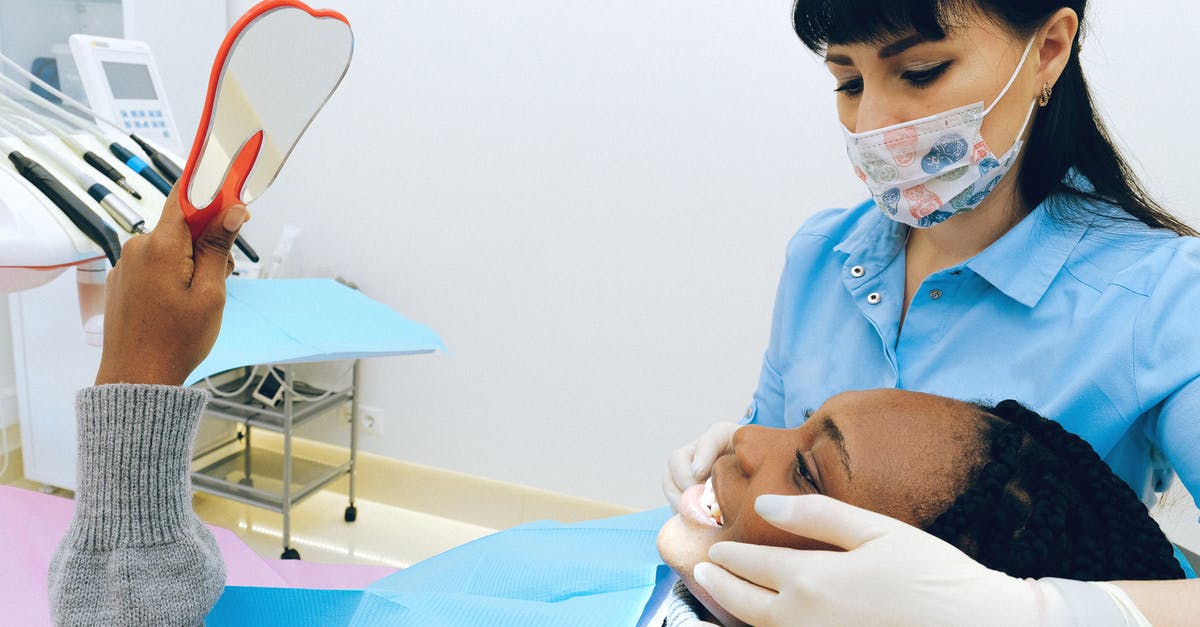 how often is cleaning done in a professional kitchen? - Woman Having Dental Check-up