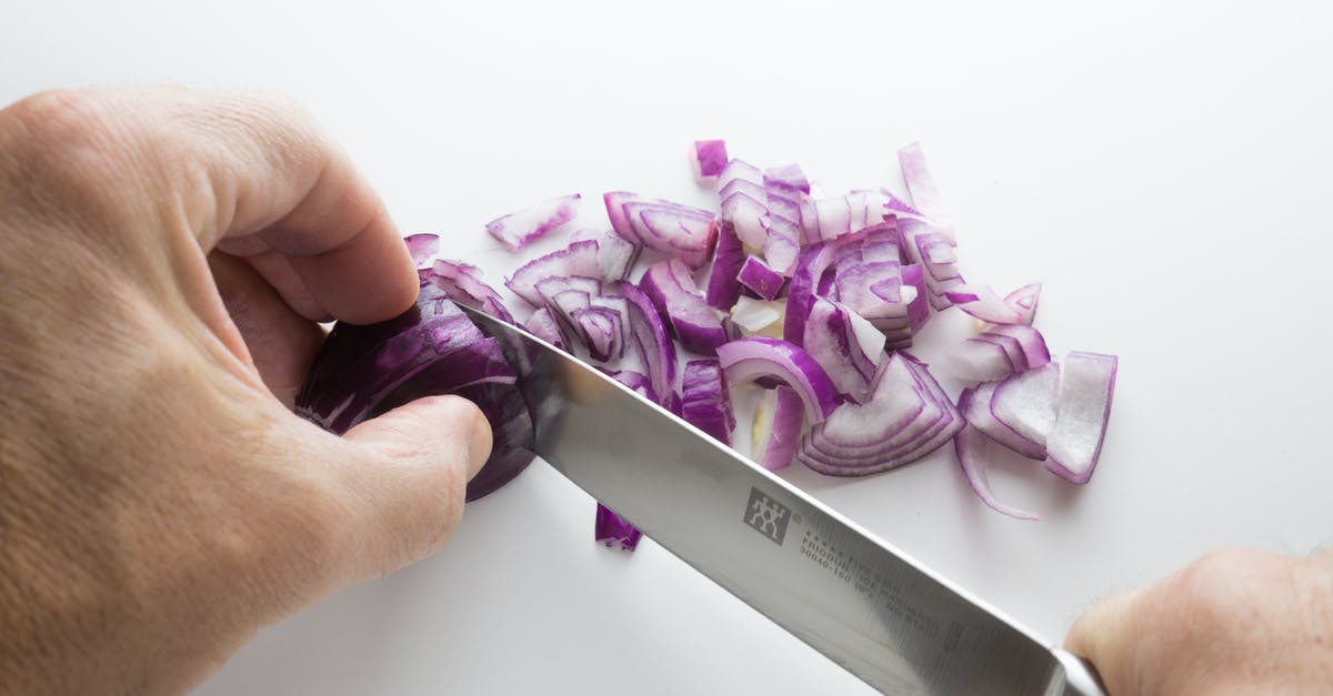 How sharp should a paring knife be? - Person's Chopping Onion