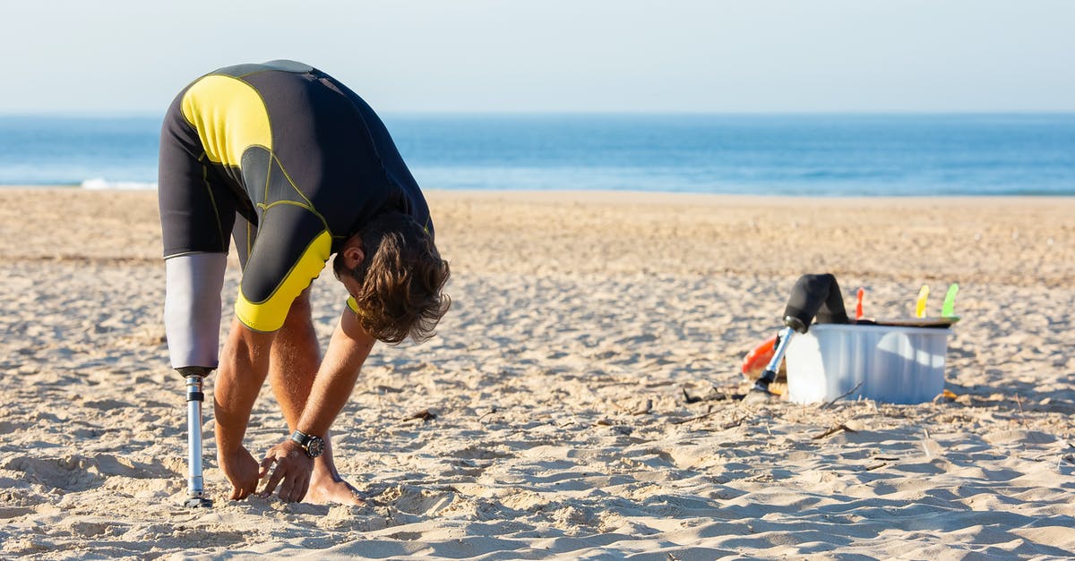 How to add water/milk to the sunny side up eggs? - Adult man with prosthetic leg warming up on beach