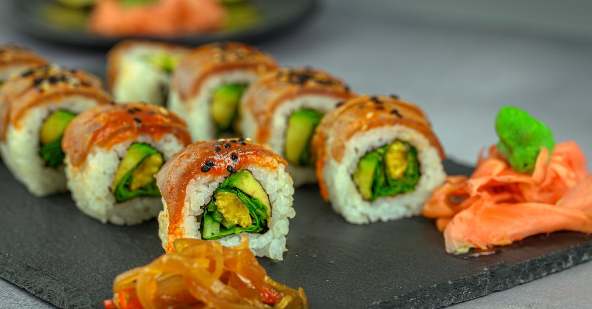 How to avoid avocado in sushi rolls from darkening? - Sushi Rolls Served on a Concrete Tray