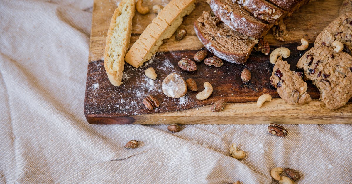 How to Avoid Soggy Chopped Nuts in Baked Goods - Cookies and Bread on a Wooden Board