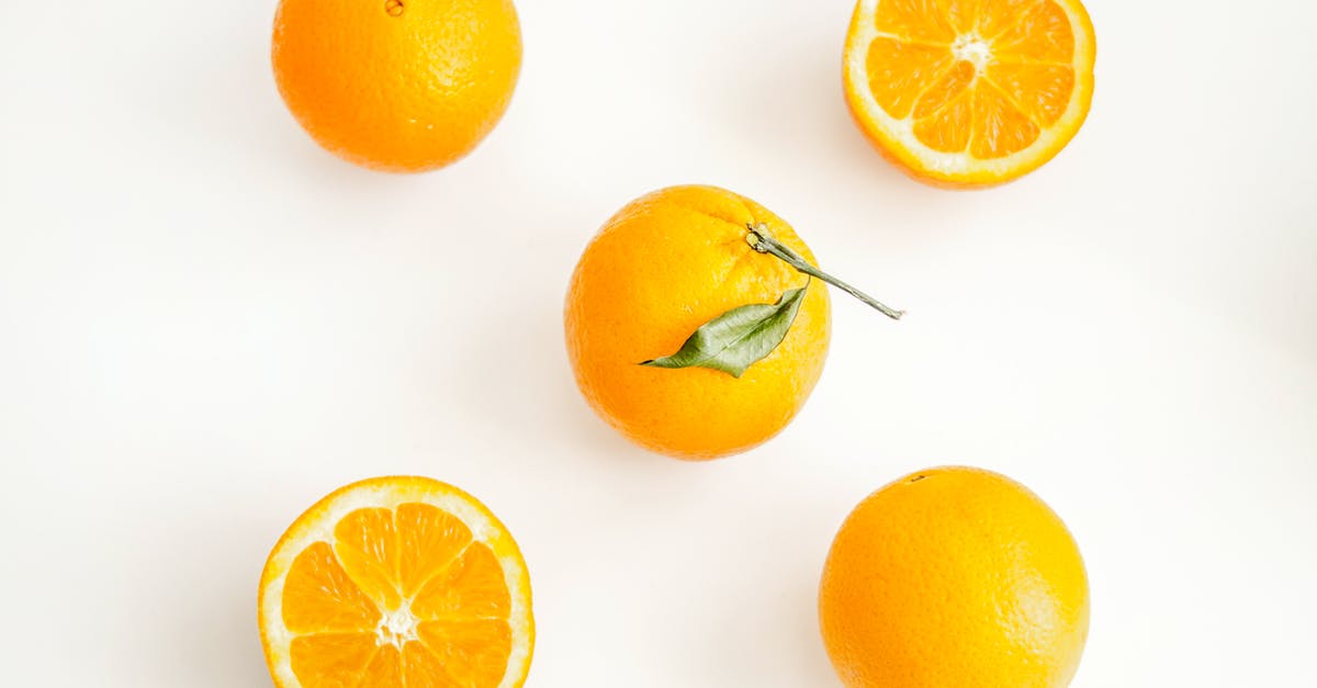 How to avoid the blackening fruits once they are cut? - Oranges on White Surface