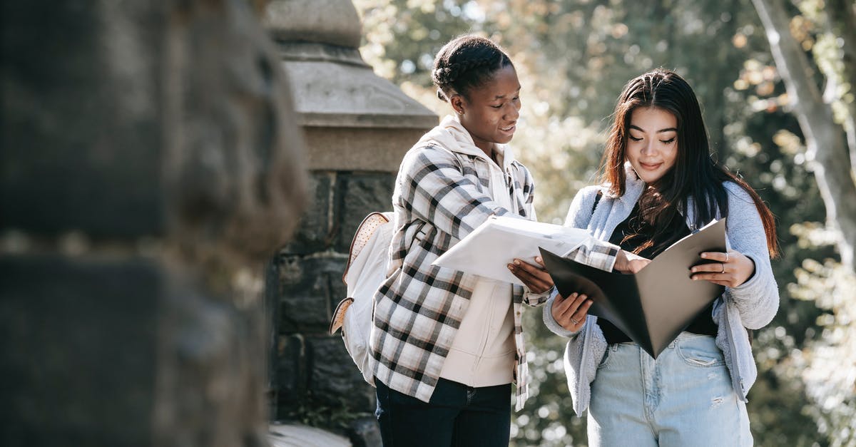 How to best prepare Sukimono - Black woman explaining homework to Asian girlfriend in town