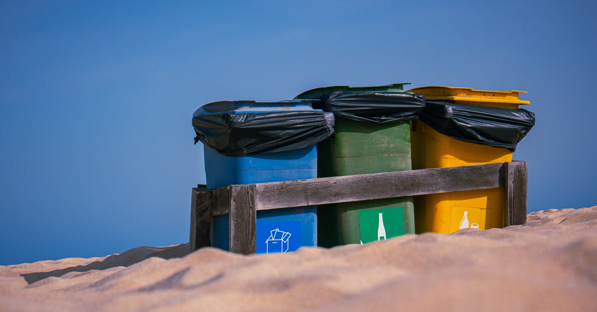 How to clean an octopus - and is it worth it - Black and Yellow Trash Bin on Brown Wooden Fence