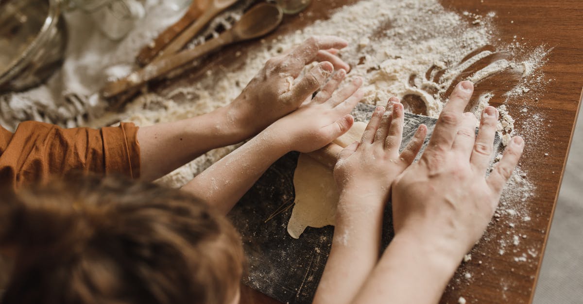 How to clean up after kneading dough? - A Parent and a Child Kneading Dough