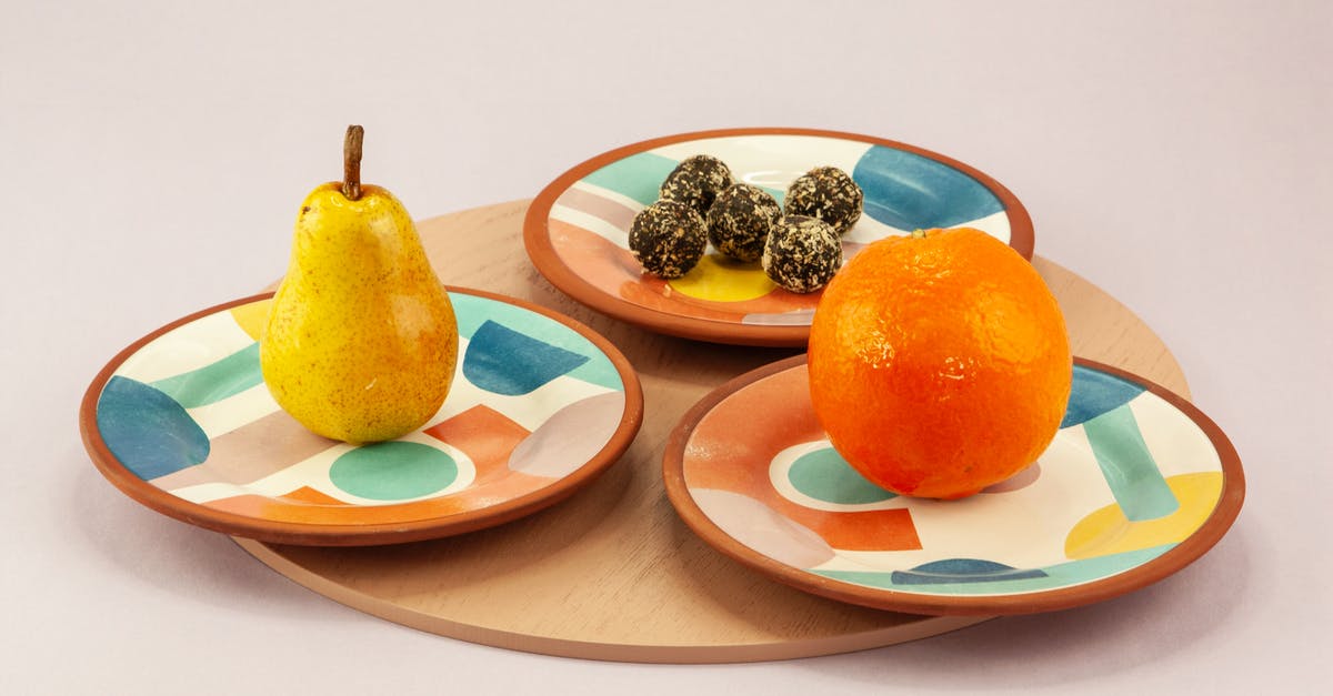 how to coat truffles with chocolate - Fresh Fruit and Chocolate Truffles on Ceramic Plates 