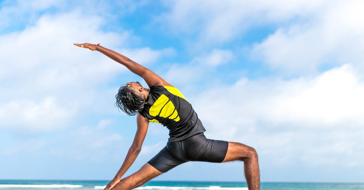 How to compare the strength of commercial natural vanilla extracts? - Person Stretching on Beach Shore