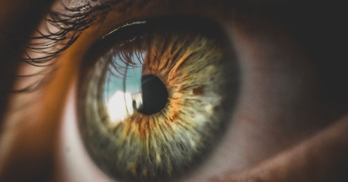 How to cook eye of round roast? - Human green eye reflecting building and blue sky