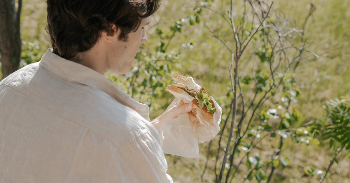 How to create fruity or grassy shortbread cookies? - Man in White Shirt Looking at White Flower