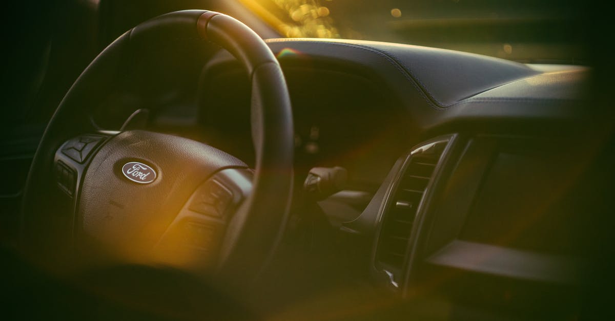 How to deal with flare up when broiling a steak? - Black and Gray Car Steering Wheel