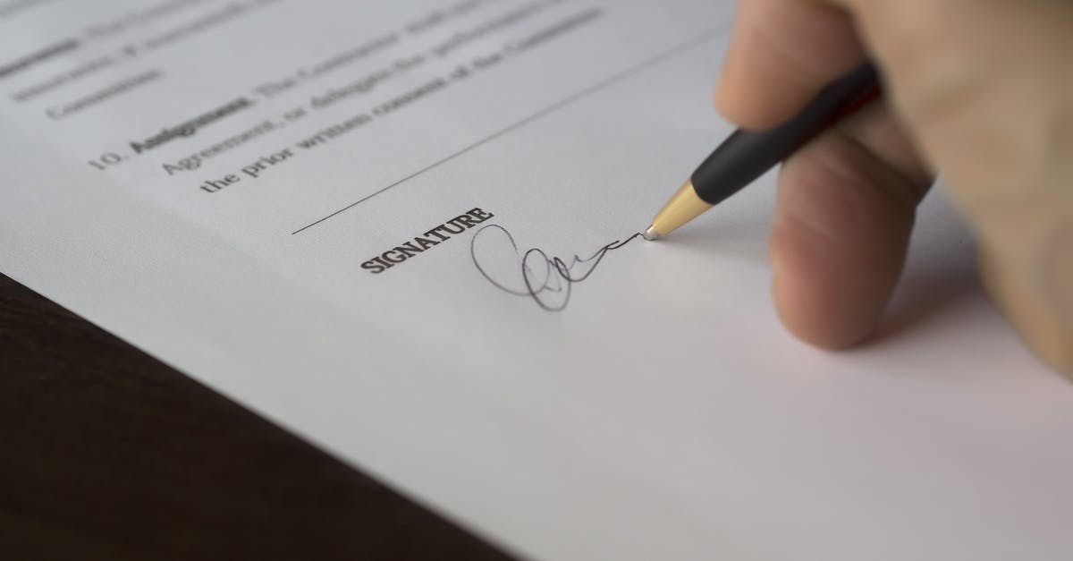 How to deal with flare up when broiling a steak? - Selective Focus Photography of Person Signing on Paper