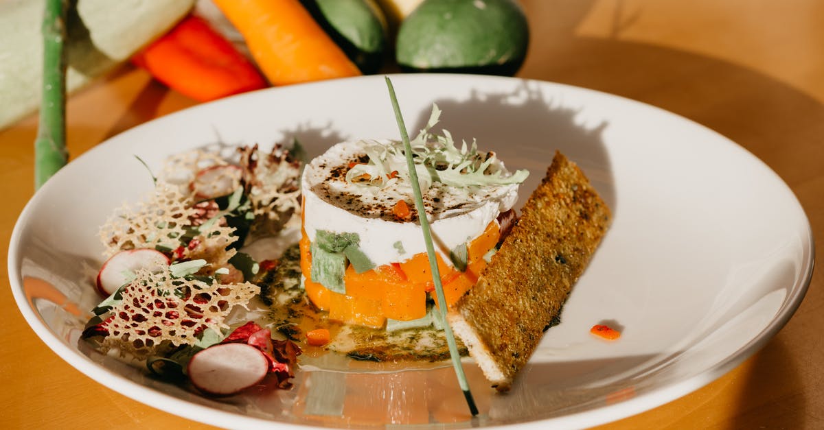 How to distinguish cream of tartar from bread improver - Delicious veggie dish with crispy bread on table in kitchen