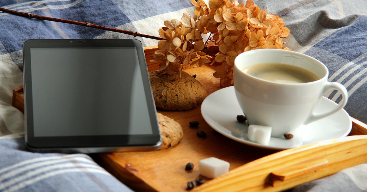 How to do hot spiced apple cider without apple cider? - White Ceramic Cup on Saucer Beside Black Ipad