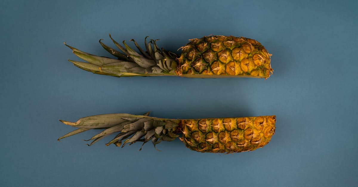 How to dry fruit peels without growing mold? - Backdrop of pineapple halves with green leaves
