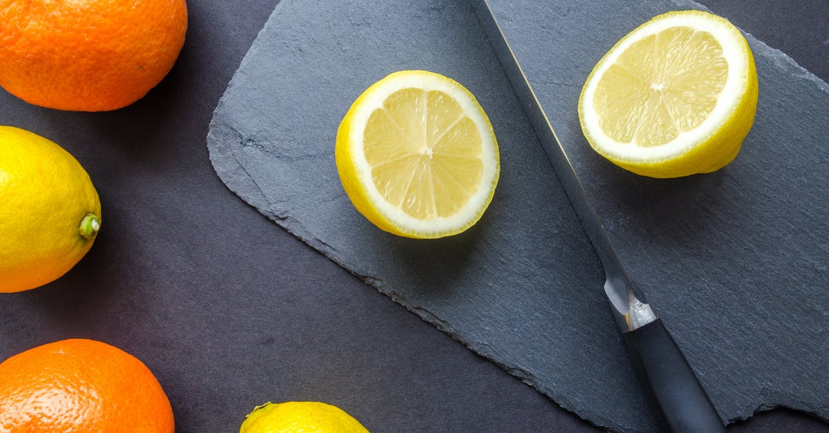 How to dry/preserve whole oranges [closed] - Two Orange and Three Lemons on Gray Surface