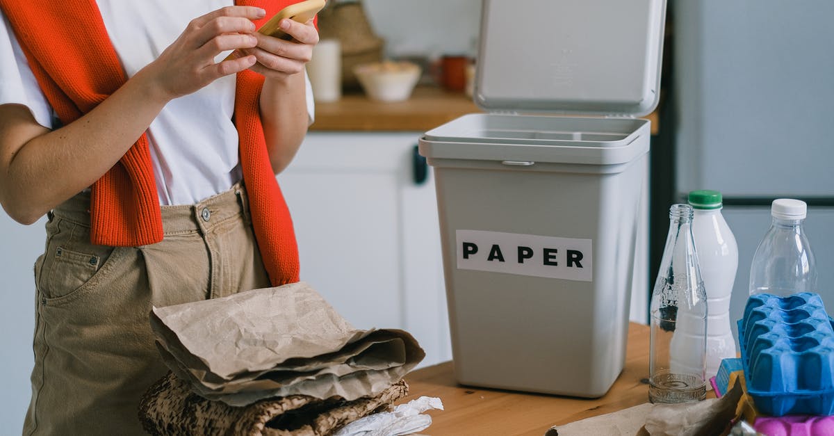 How to easily minimize waste using a potato smasher? - Crop person browsing cellphone while sorting waste