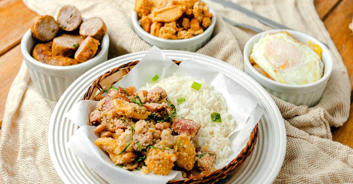 How to fry an egg without a burnt thin crust around? - Toothsome dish of fried sausages served with rice