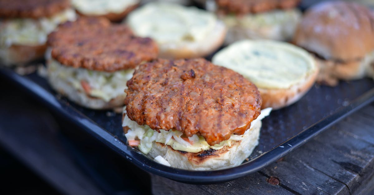 How to fry crispy bananas? - Grilled burgers placed on salver on wooden table