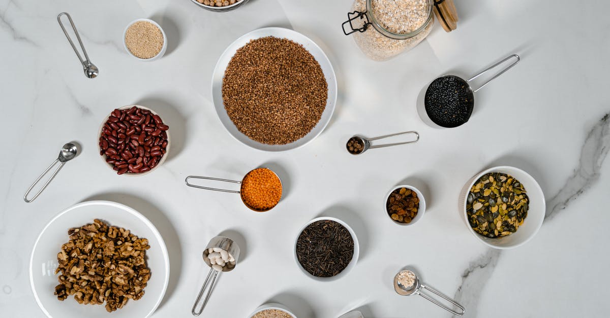 How To Get Flavour Into Dried Grains And Pulses - Assorted Dried Herbs and Spices Over a Marble Top Table