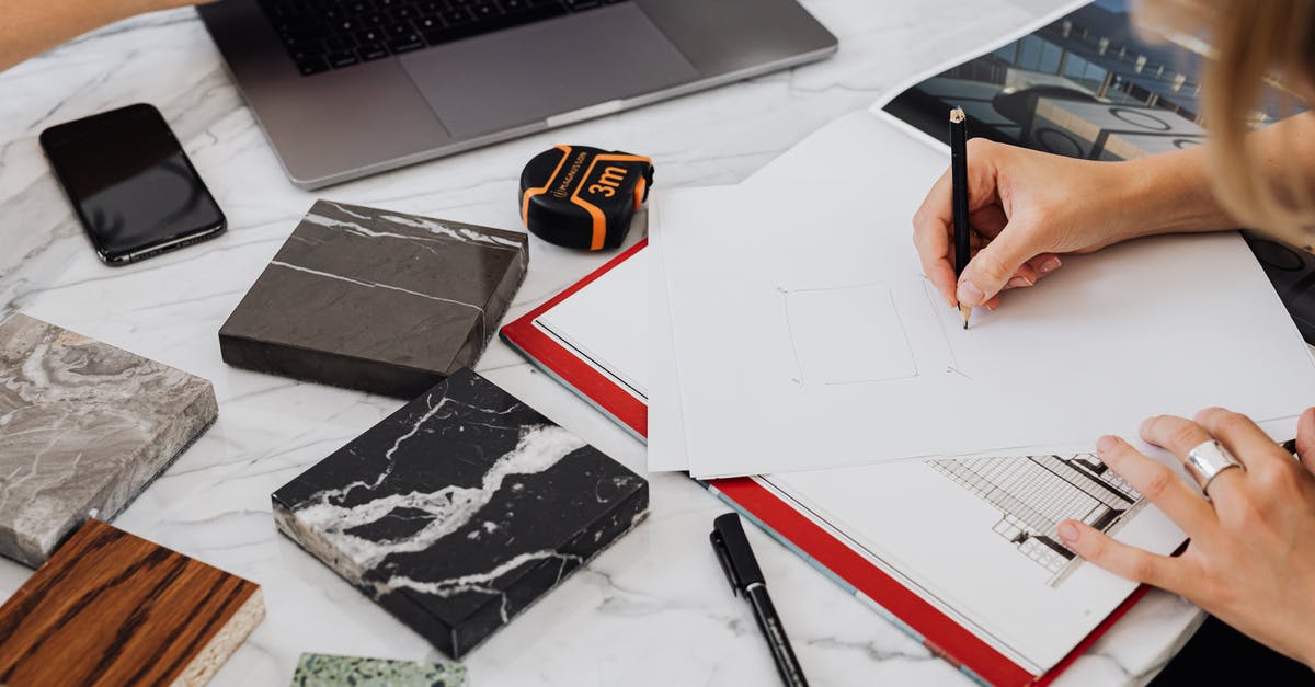 How to get good design on marble cake? - Person Holding Black and White Smartphone