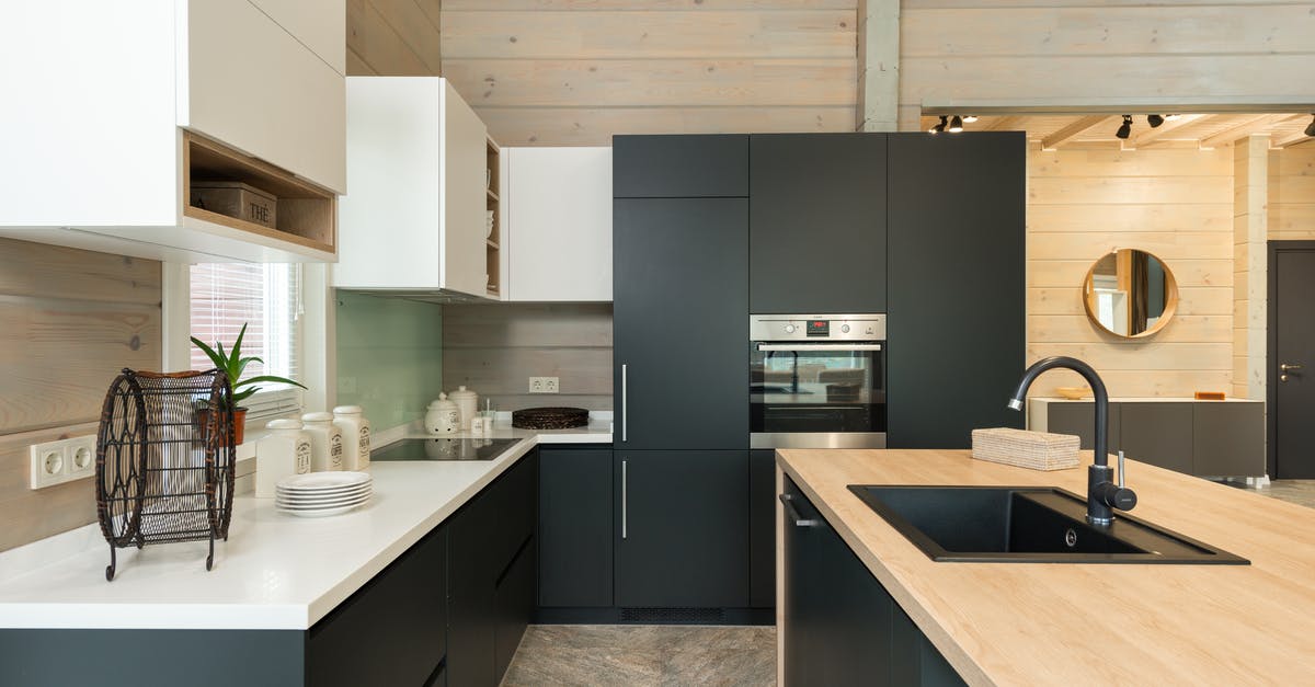 How to get uniform bubbles in simple dutch oven bread? - Modern kitchen with matte cupboards and built in appliances