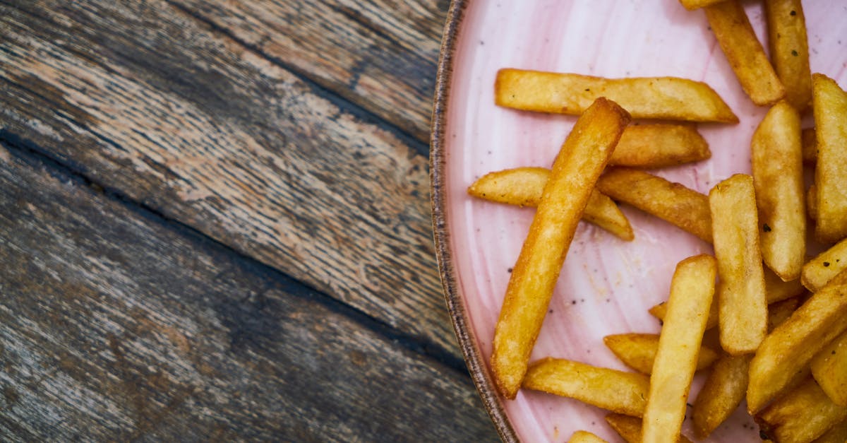 How to get very smooth, flat cooked potato pieces - Fried Fries On Plate