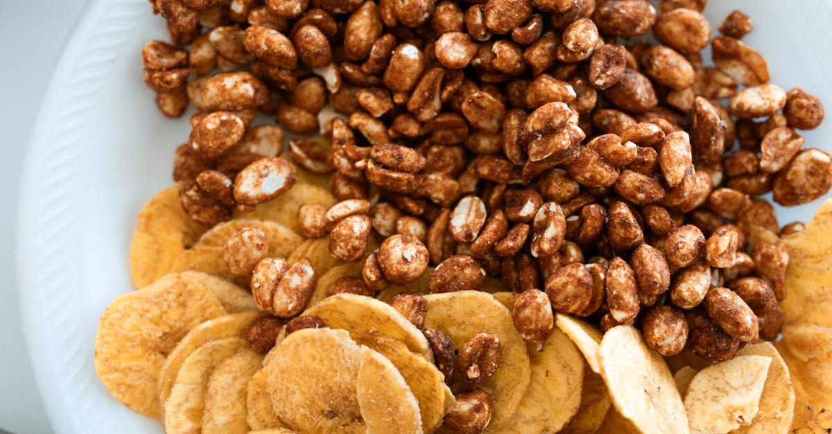 How to honey roast peanuts? - Close-Up Shot of Banana Chips and Honey Roasted Peanuts