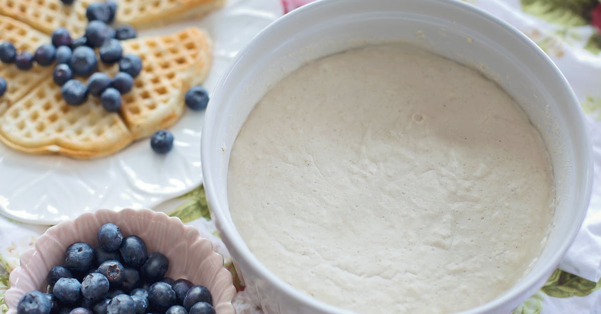 How to Judge the Appropriate Feeding Schedule for Immature Sourdough Starter - White Plastic Container With Black Beans