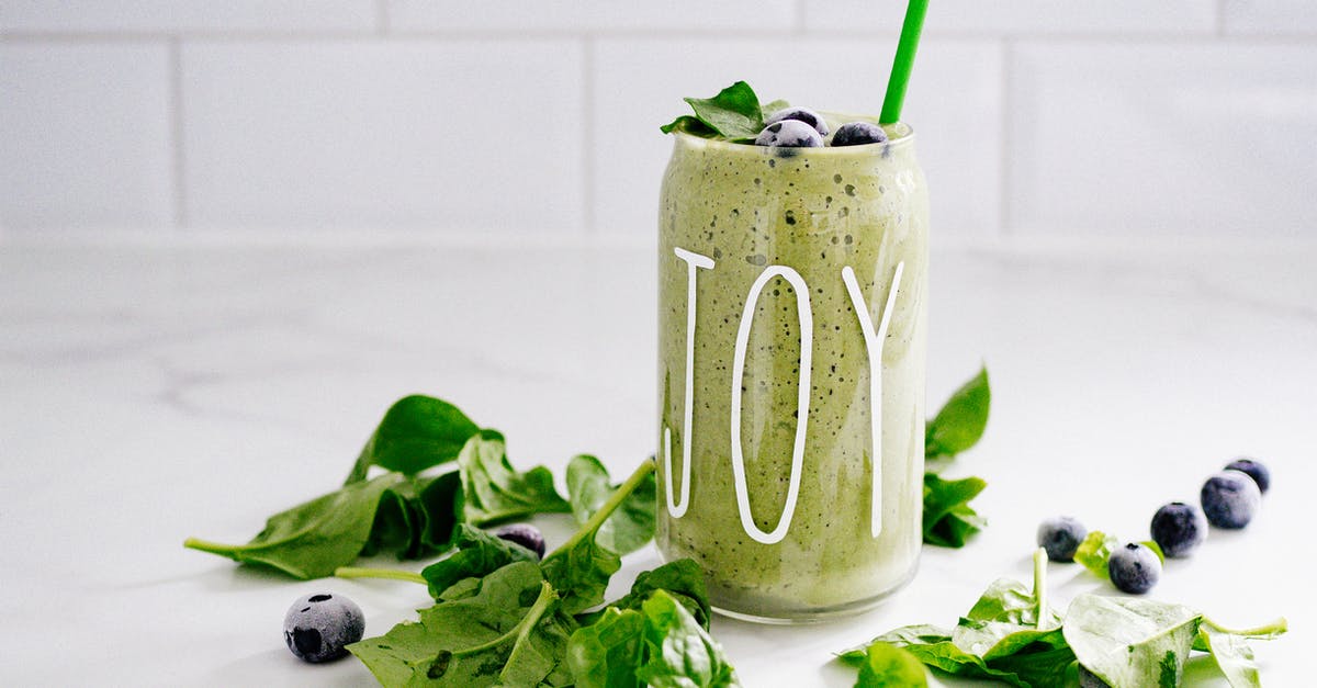How to keep a green smoothie from getting 'frothy'? - Green Fruit and Veg Smoothie Served in Jar with Straw