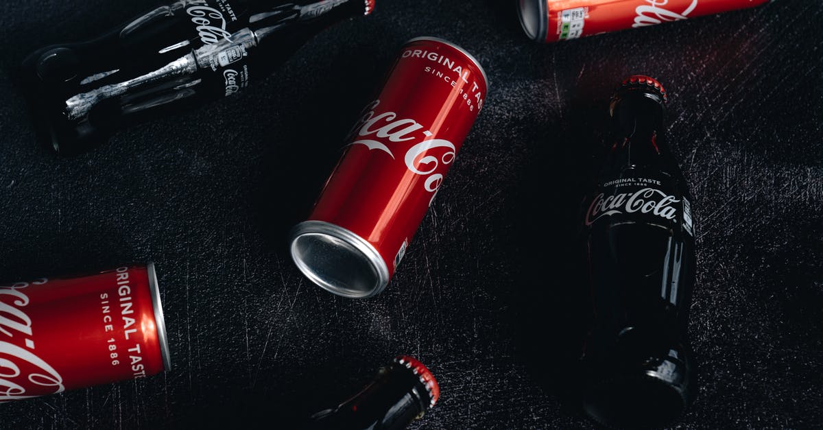 How to keep drinks carbonated - Close-Up Photo Of Canned And Bottled Soft Drinks