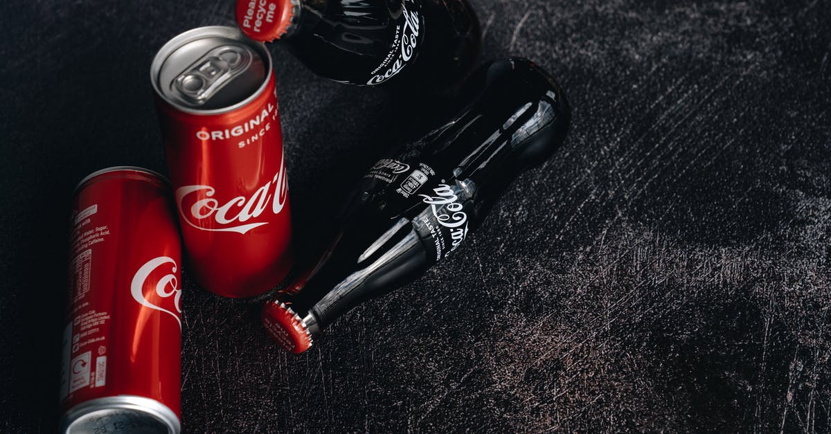 How to keep drinks carbonated - Close-Up Photo Of Canned and Bottle Soft Drinks