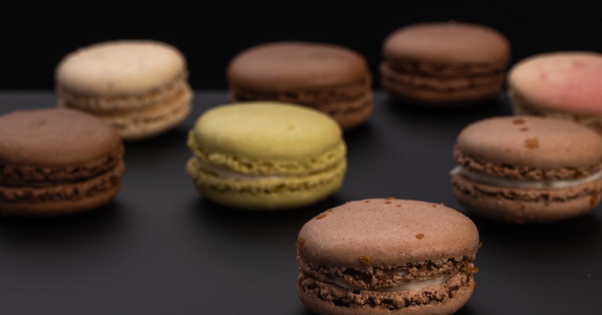 How to keep edible cookie dough soft after refrigerated? - Small round macaroons on black surface