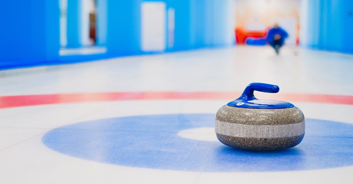 How to keep frozen beans soft? - Curling stone placed in house on ice rink