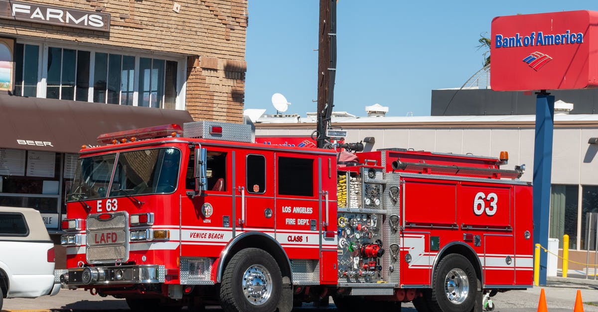 How to keep pork crispy during transport to venue? - Red Fire Truck Parked In Front Brick Building