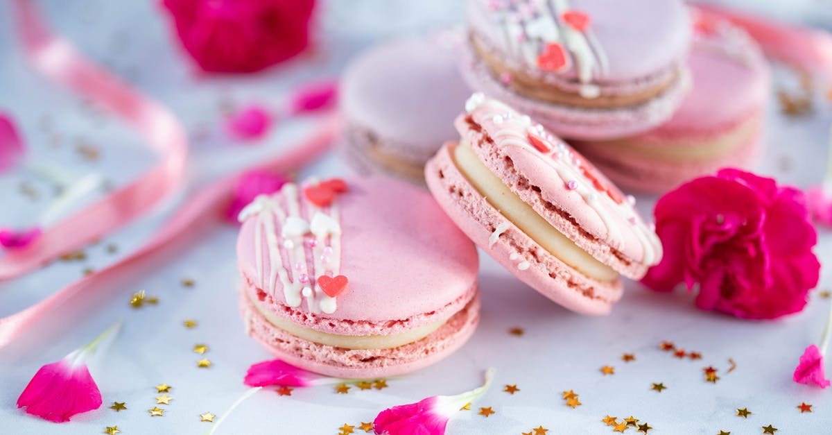 How to make a dessert with dynamically opening flower petals? - Sweet macaroons on plate near flower