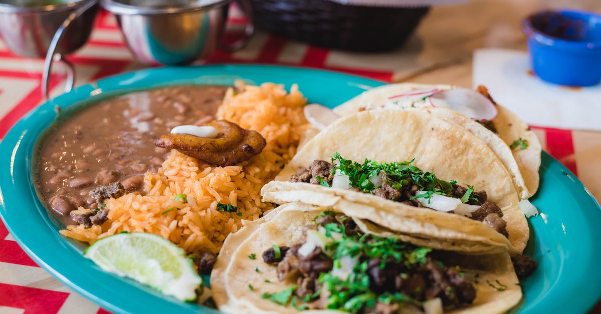 How to make chunky salsa like supermarket jarred salsa? - Close-Up Photo of Rice and Tacos