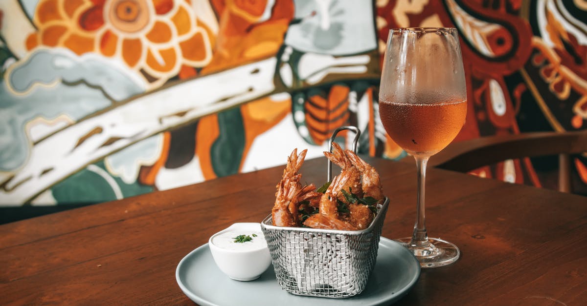How to make deep fried beer? - Fried Shrimps with Sauce on White Plate Beside Glass of Drink