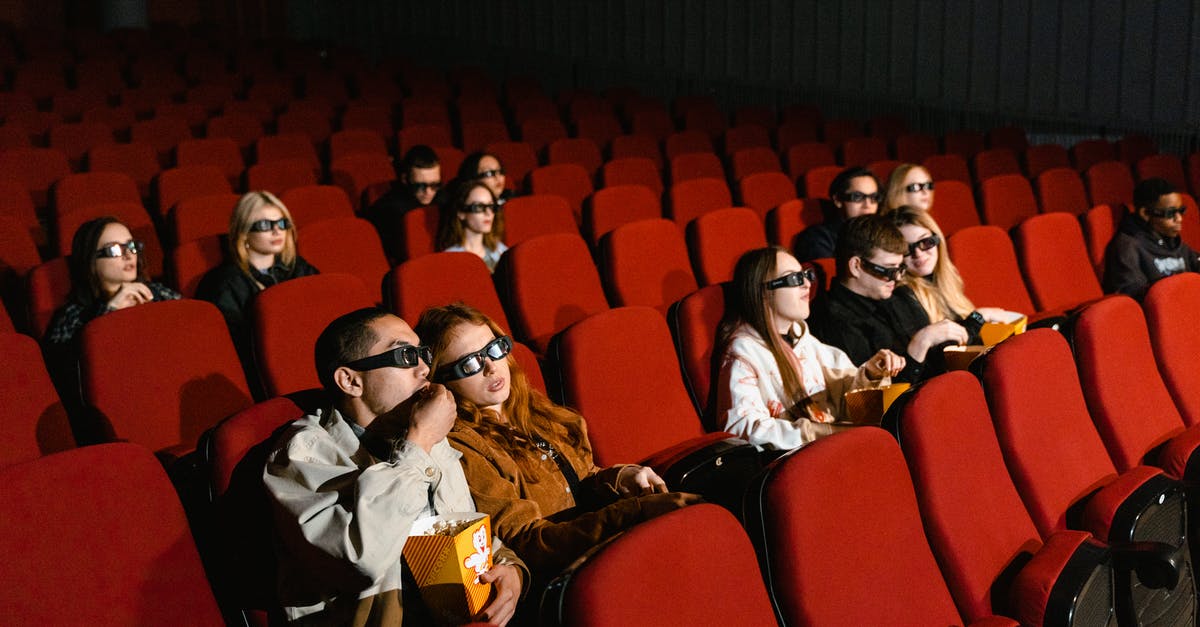 How to make Movie Theatre like Popcorn? - People Sitting on Red Chairs