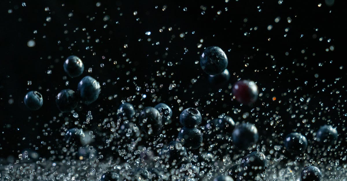 How to make round popcorn? - Close-Up Photo of Blueberries in Black Background