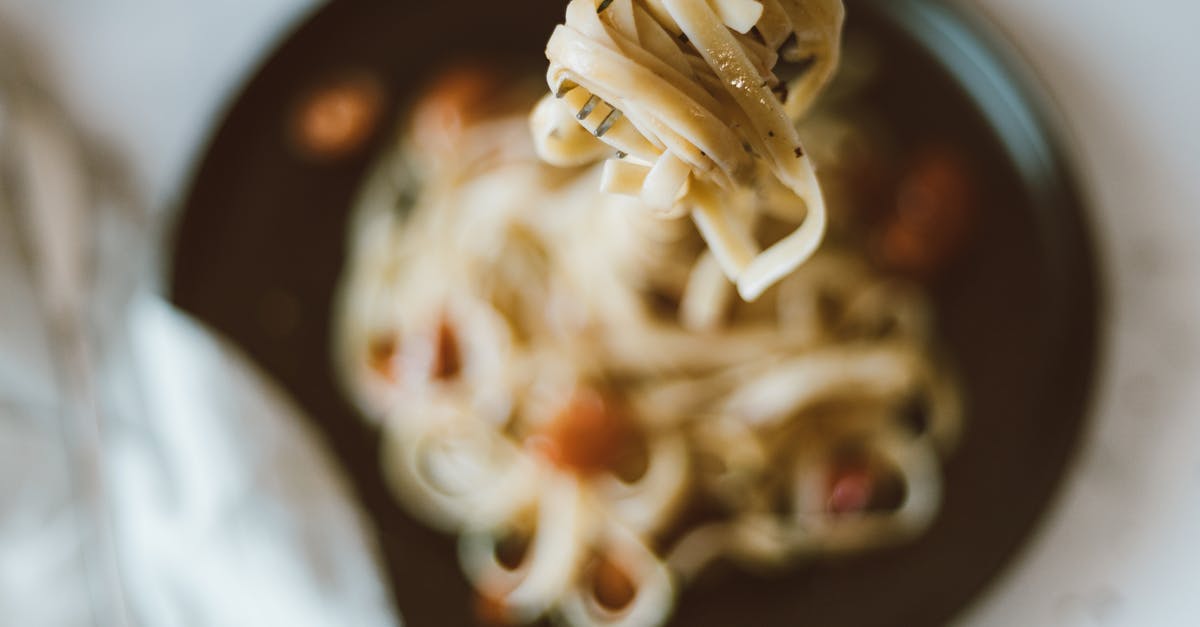 how to make soup less 'meaty'? - Pasta Dish on Black Plate