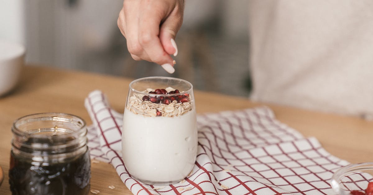 How to mark yogurt jars? - Person Preparing a Clear Glass of Food