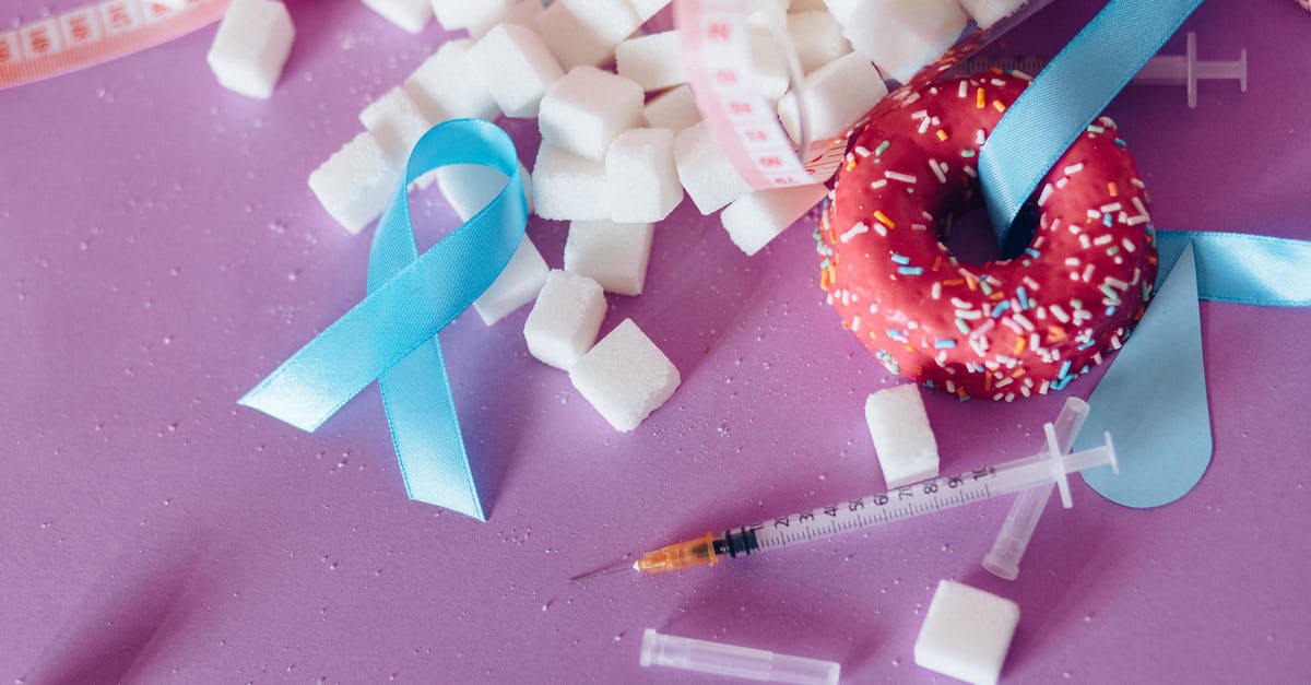 How to measure food acidity - White and Red Candy Cane on Pink and White Heart Shaped Paper