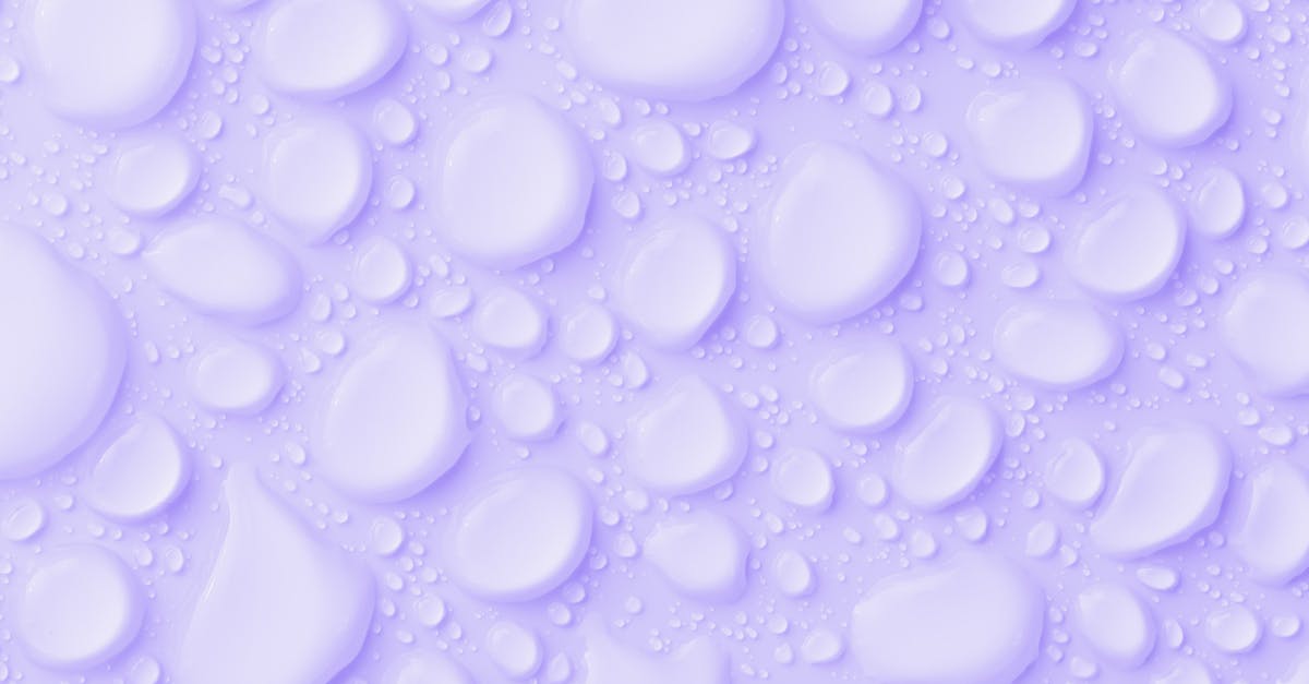 How to minimize splatter using an immersion blender? - Waterdrops On Purple Background