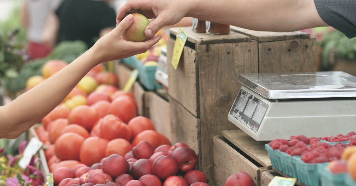 How to not buy the bad apple? - Person Giving Fruit to Another