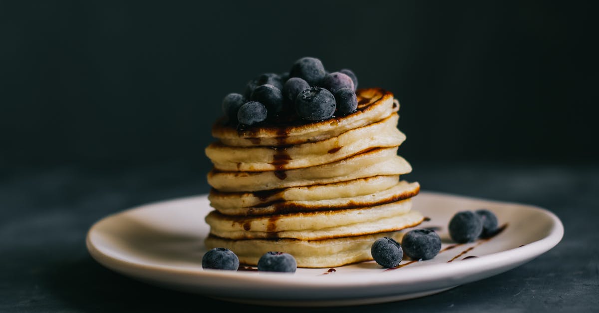 how to not get burned keto flour pancakes? - Delicious pancakes served on saucer with blueberries