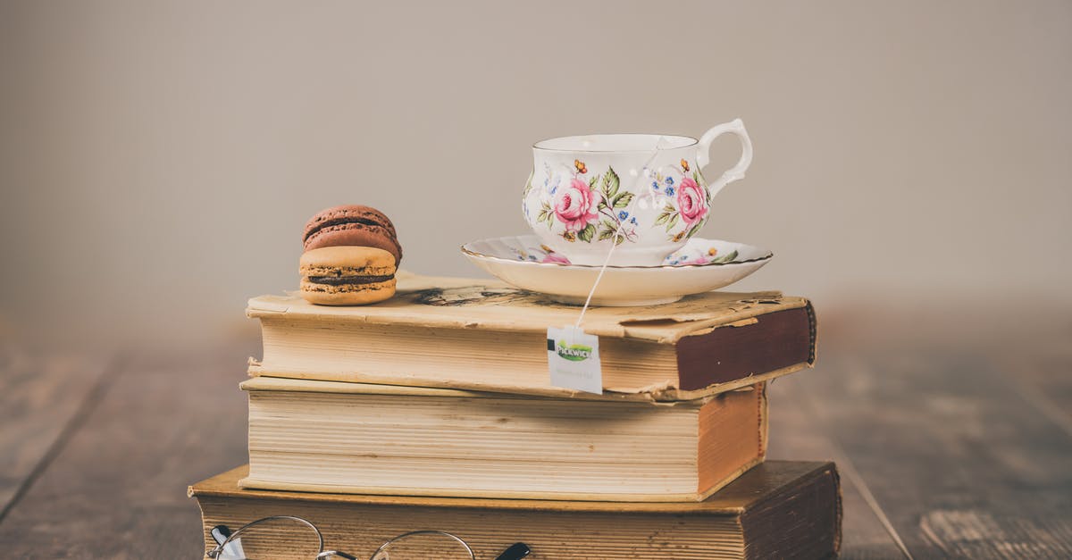 How to not make my macarons rip? [duplicate] - Photo of Teacup On Top Of Books