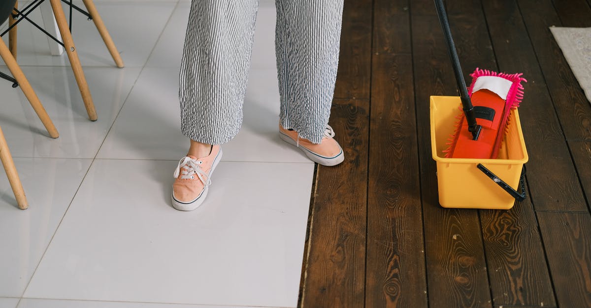 How to prepare celery for dipping? - Faceless housewife preparing to wash floor at home