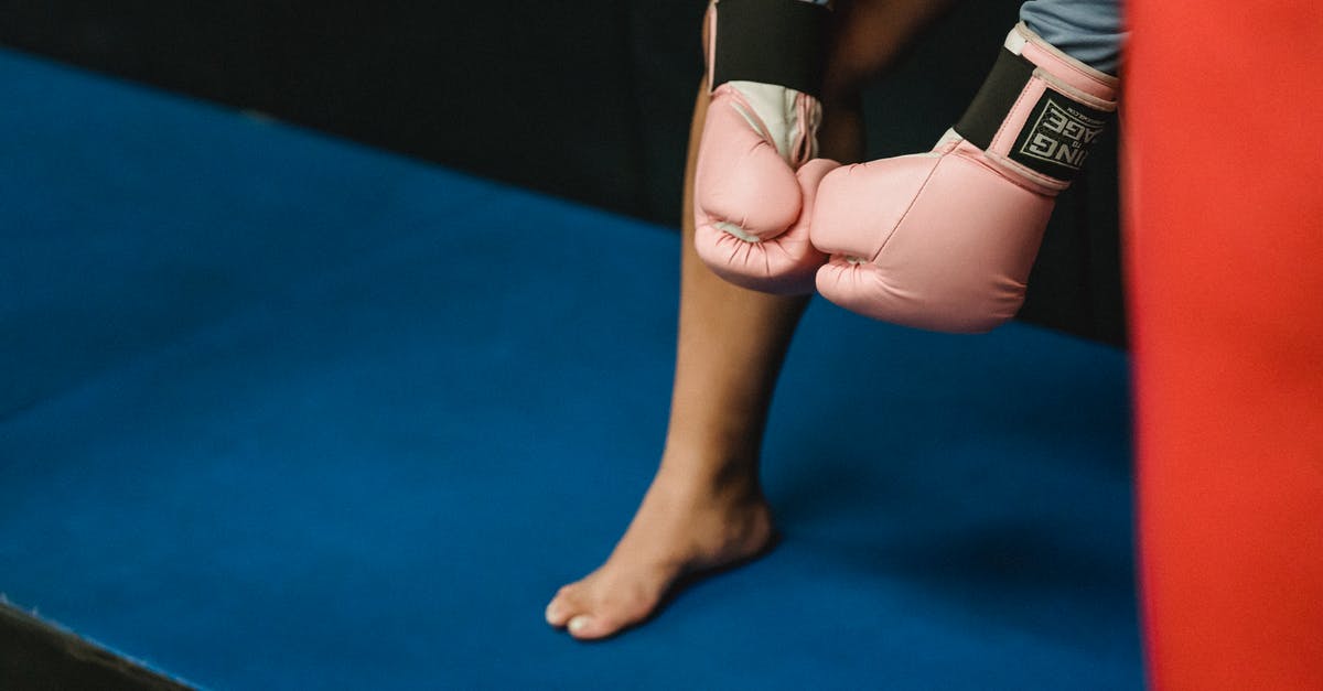 How to prepare mutton so it's not tough? - Unrecognizable woman in boxing gloves standing in ring